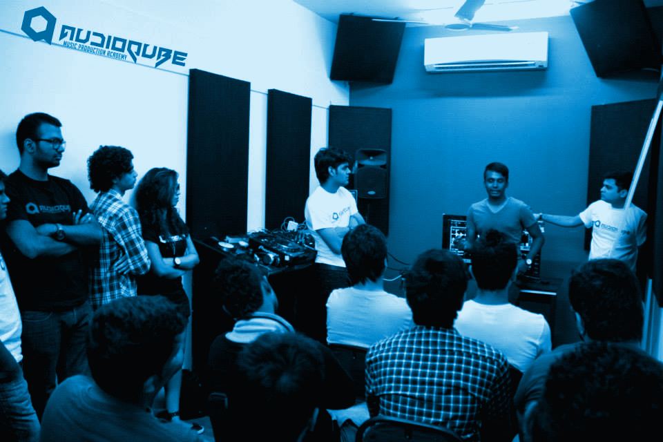 Students gathered around the DJ booth during the DJ Nawed masterclass